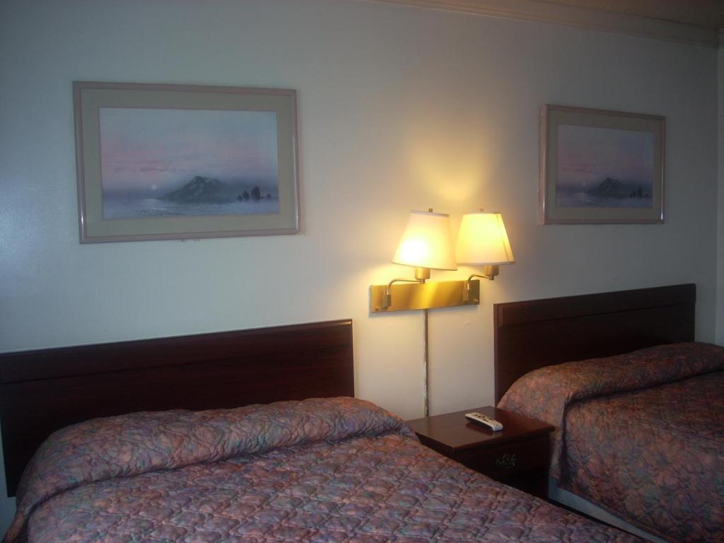 Economy Inn Сисайд Экстерьер фото