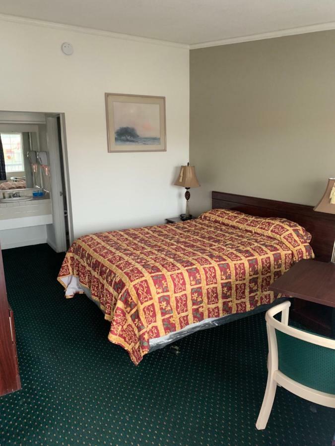 Economy Inn Сисайд Экстерьер фото